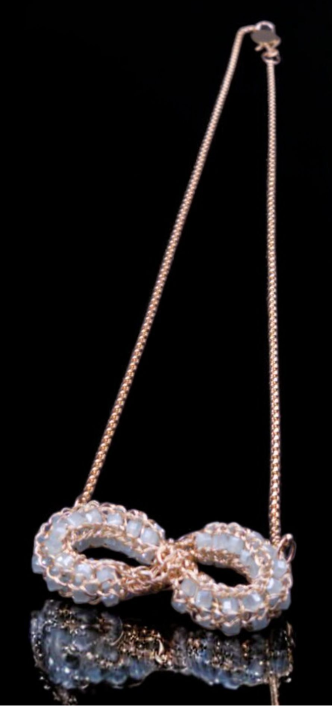 The Eternal Light. Necklace: A Symbol of Infinite Connection